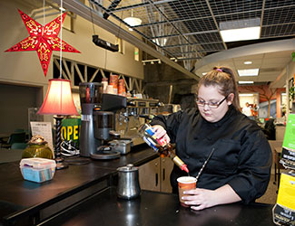 Photo: Student making a latte